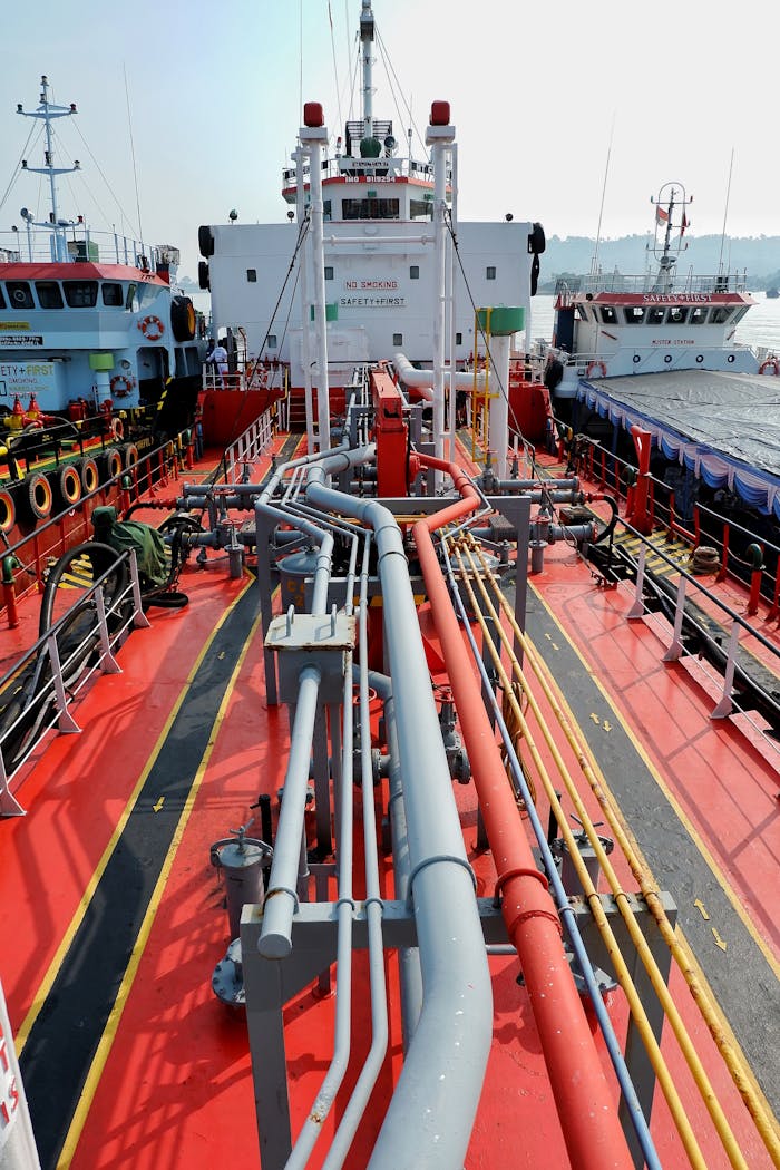 The Art of Drawing Readers In: Your attractive post title goes here A detailed view of a shipping tanker's deck and pipeline system docked in Banten, Indonesia.